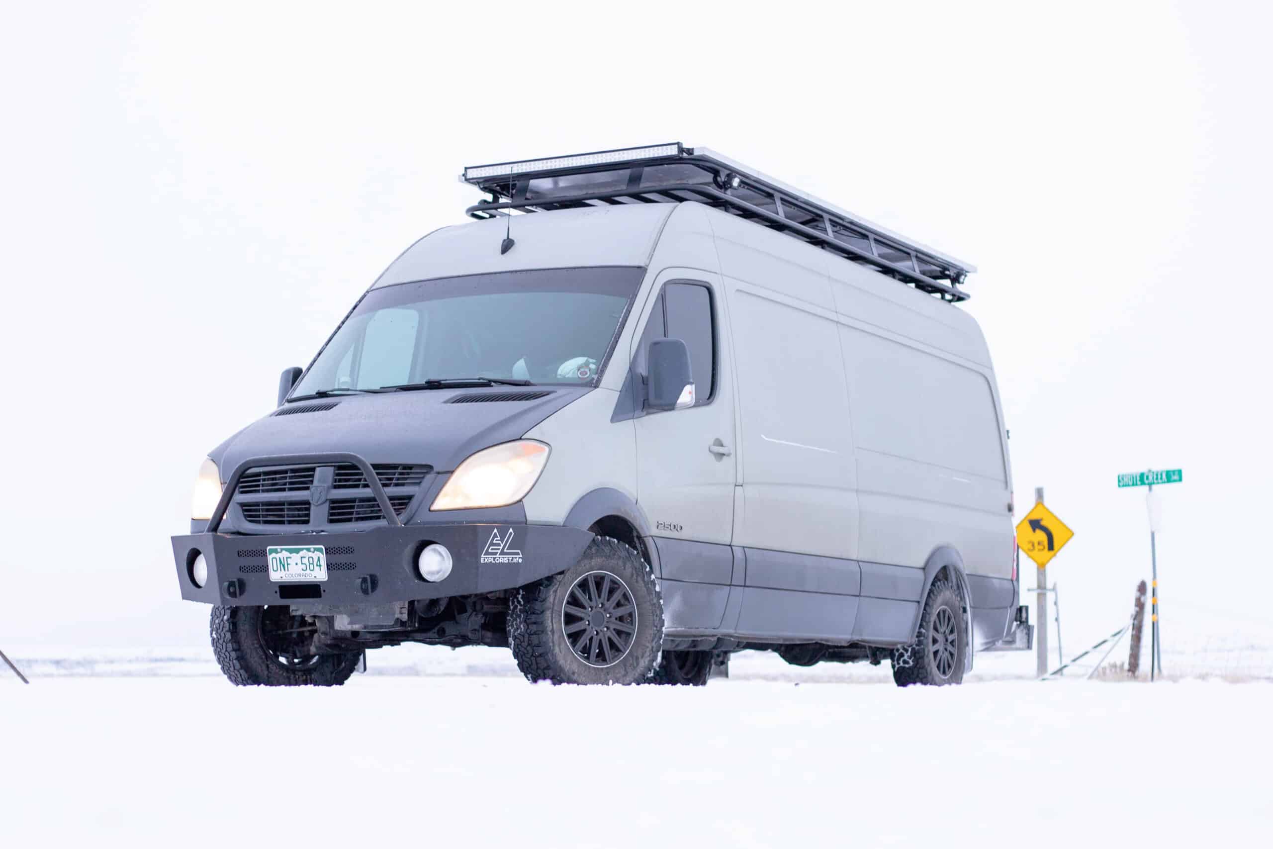 Van driving through the snow
