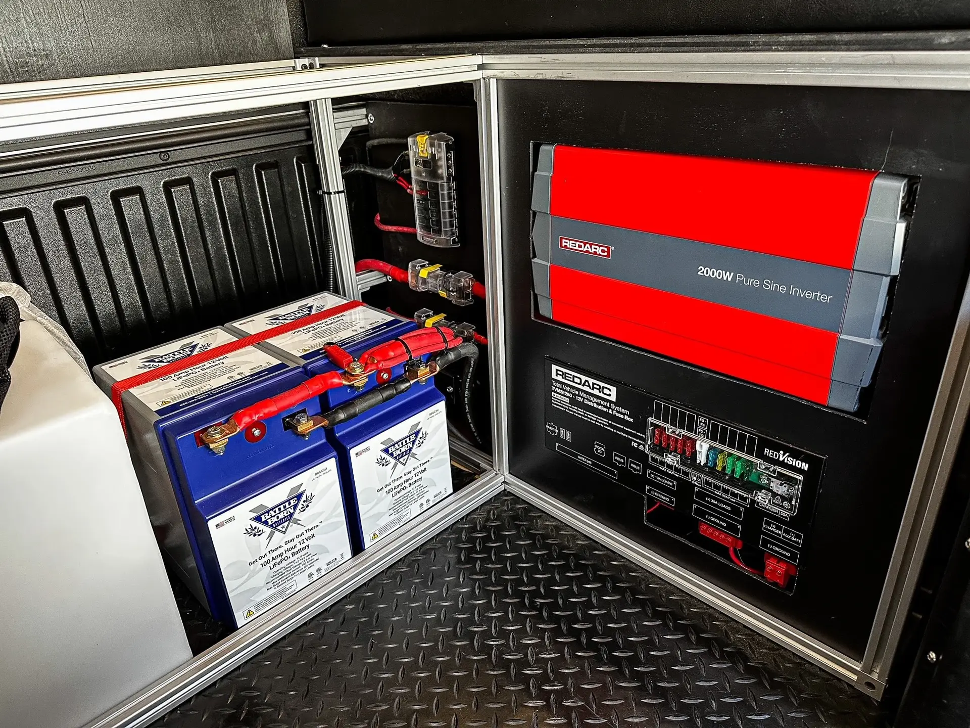 Deep cycle Battle Born lithium batteries installed in a system with a redarc charger
