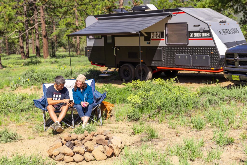 couple off grid monitoring their system with the Battle Born Mobile app